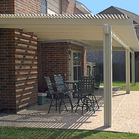 photo of lattice-style patio/shad cover w/ aggregrate patio